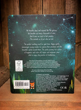 Load image into Gallery viewer, Image of the back cover of the board book of Happy - A Children&#39;s Book of Mindfulness with a blue background illustrated with stars and constellations and blurb in white text.