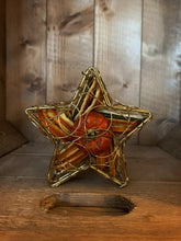 Load image into Gallery viewer, Image of Scent of the Season Star Centrepiece, a gold wire box in the shape of a star filled with pot pourri including dried orange and green orange slices and a dried mini pumpkin