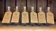 Load image into Gallery viewer, Image shows the full range of Airs and Graces bottles. From left to right: Hot Air, Thin Air, Breath of Fresh Air, Ill Wind, Trapped Wind, and Winds of Change.