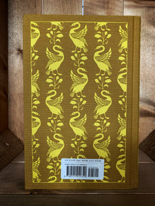 Image of the back cover of the Penguin clothbound classic book Pride & Prejudice featuring a yellow ochre background with a yellow printed repeat pattern of standing swans and leafy stems.