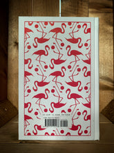 Load image into Gallery viewer, Image of the back cover of the clothbound classic Alice&#39;s Adventures in Wonderland, the cover features a repeat pattern print in bright pink with flamingos and croquet balls.