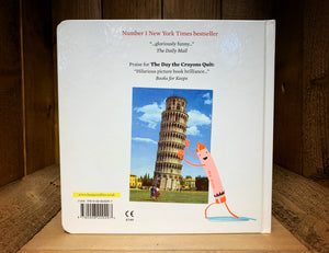 Image shows the back cover of the board book The Day The Crayons Came Home showing a postcard image of the leaning tower of Pisa and Neon Red crayon trying to push it upright.