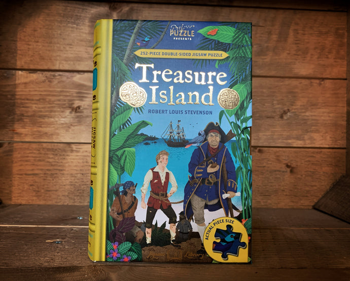 Image showing the book-shaped Jigsaw Library Treasure Island with a front cover design featuring Long John Silver and his crew mate Jim Hawkins on a desert island with a ship in the distance out to sea.
