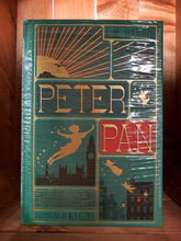 Load image into Gallery viewer, Image showing the Peter Pan MinaLima edition book with a jade green clothbound cover. The front cover is printed in gold, red and dark green and shows mini illustrations from the tale including a sunrise over Pirate&#39;s Cove with a pirate ship, Peter Pan flying over London&#39;s skyline with Tinkerbell, Wendy and her brothers all flying out of their bedroom window.
