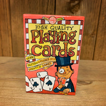 Load image into Gallery viewer, Image shows the front of the box of playing cards. It is a standard sized pack, and states that it contains instructions for a variety of games.