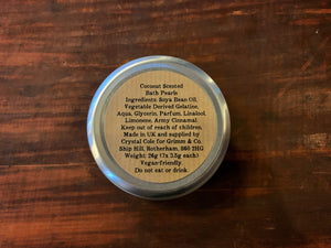 Image is a top-down view of the bottom of a tin of Pearls of Wisdom, showing the ingredients. 