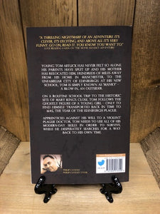 Image of the back of the paperback book Crow Boy with the blurb in white text on a black background.